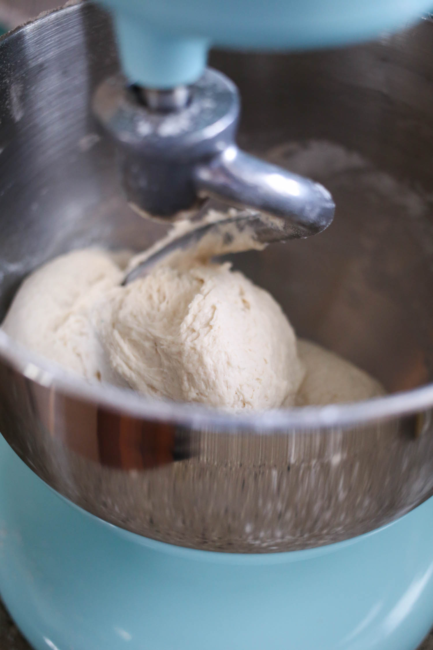 dough pulling away from side of the bowl