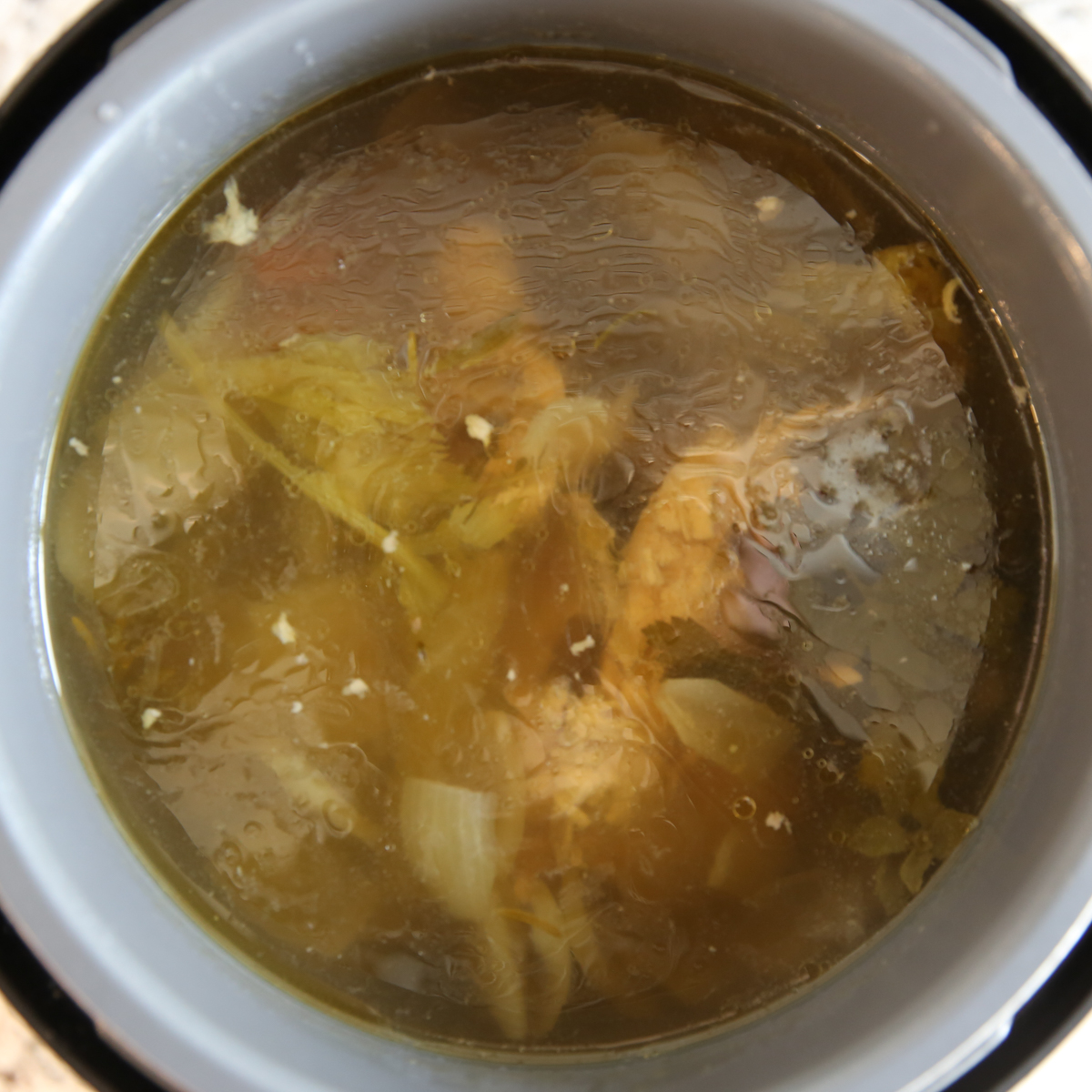 Homemade Chicken Broth in a pot