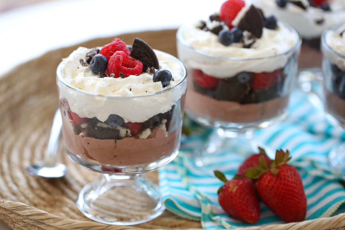 mini chocolate layered trifles with fruit on top