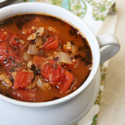 A little white pot full of Lasagna Soup.