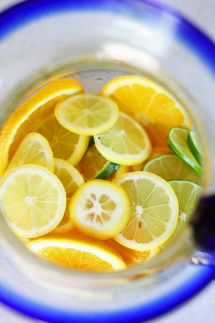 sliced fruit in pitcher for sangria