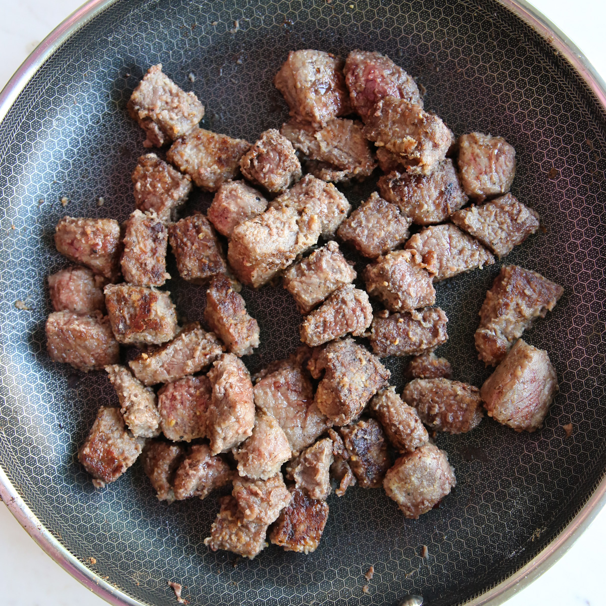 beef in a saute pan