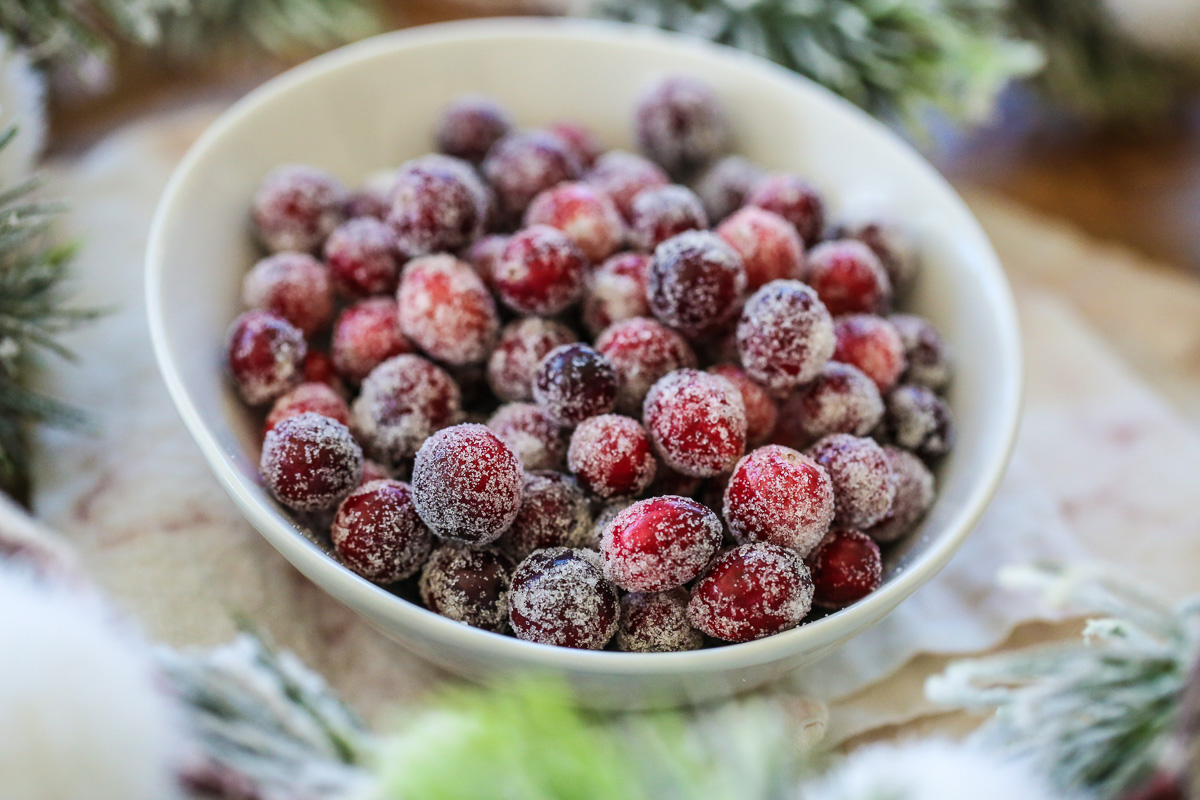 bowl of fresh cranberries covered in sugar
