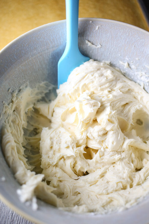 frosting in a bowl with a spatula
