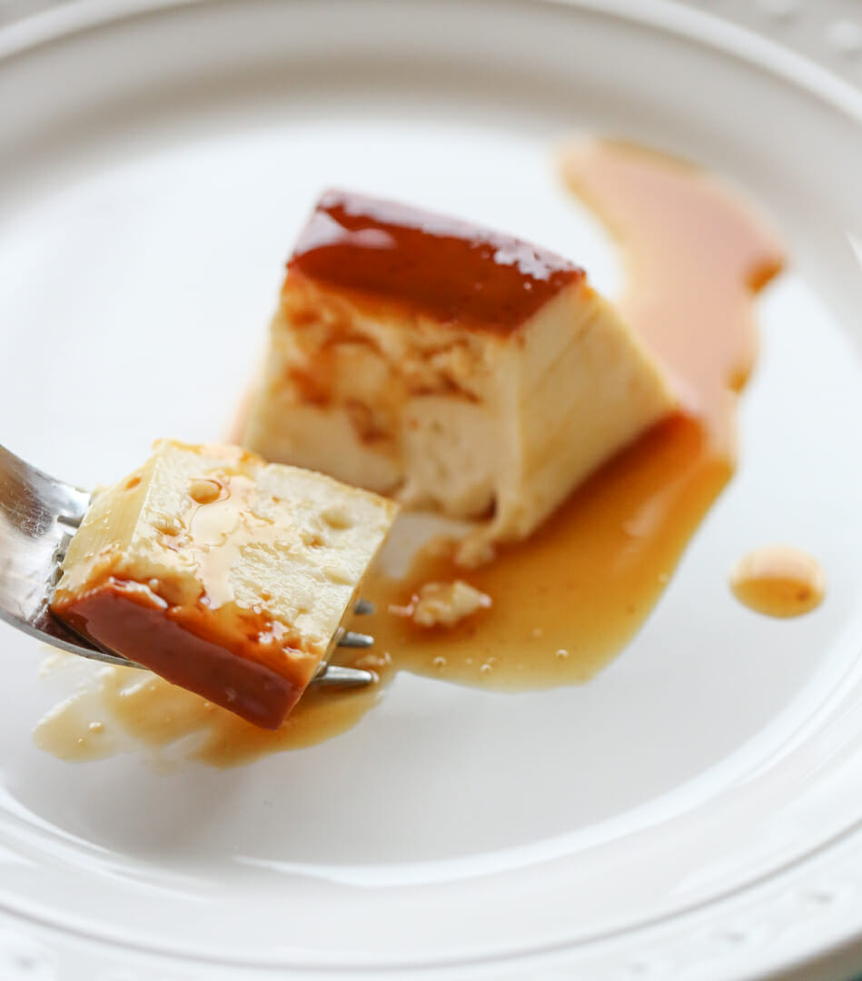 bite taken out of brazilian flan