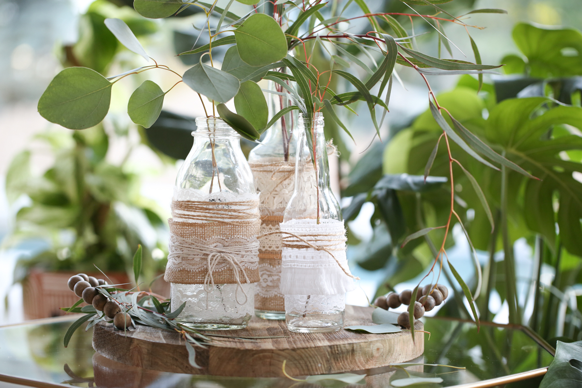 lace and burlap decorated vases