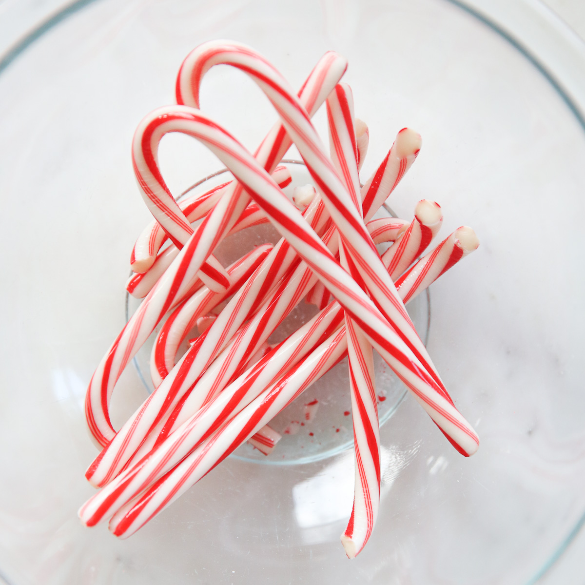 candy canes in a glass bowl