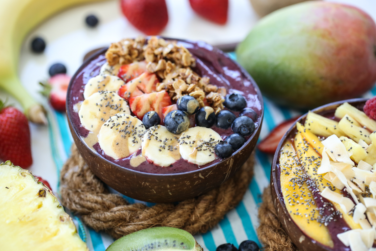 acai bowls topped with tropical fruit