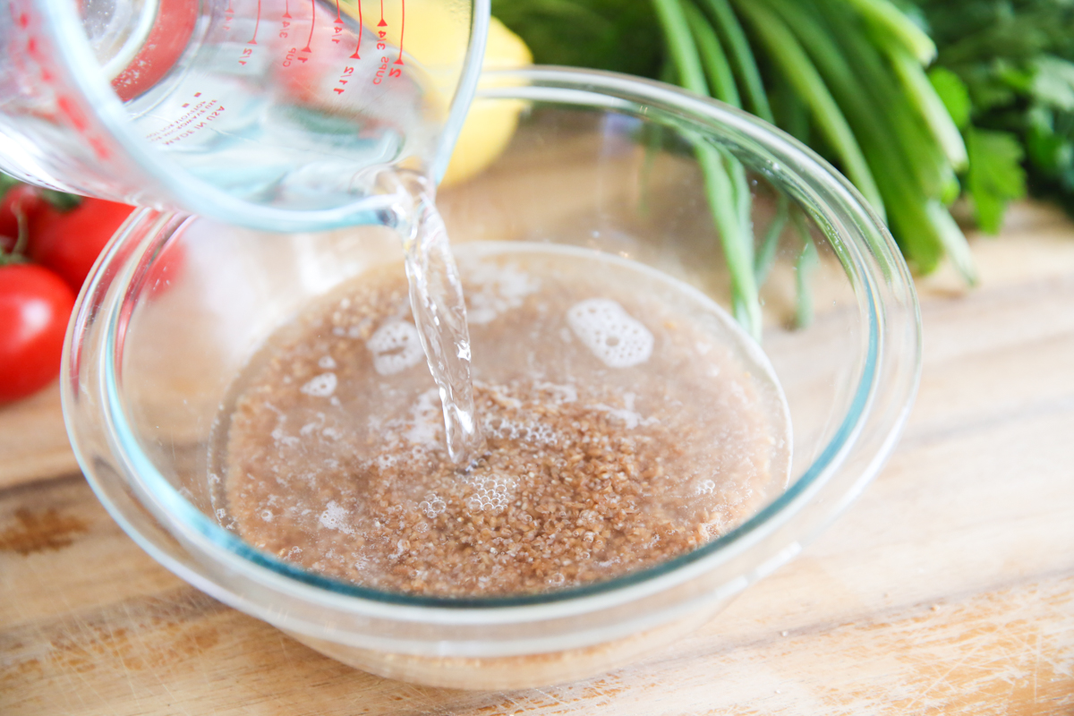 pouring water into bulgar wheat