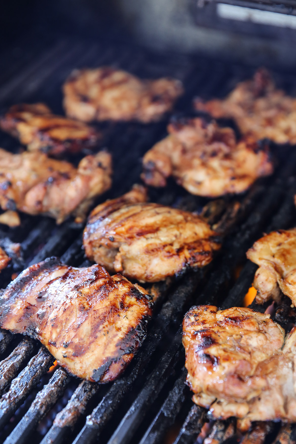Huli Huli chicken thighs on the grill.